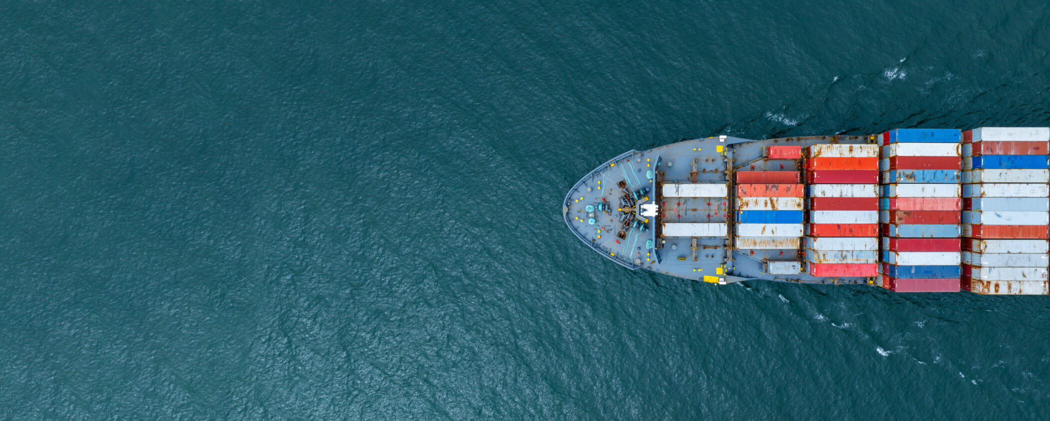 cargo-container-ship-top-view-carrying-container-and-running-for